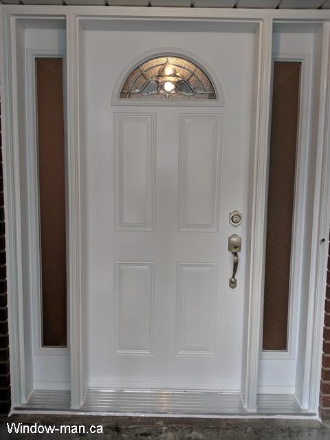 Front door and two sidelights. Just another project. Half-moon glass. Privacy Acid each glass